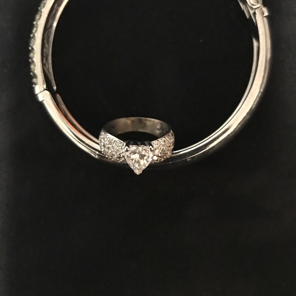 Heart shape silver diamond ring.